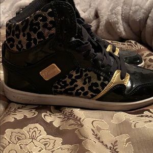 Pastry black and gold cheetah high top gym shoes